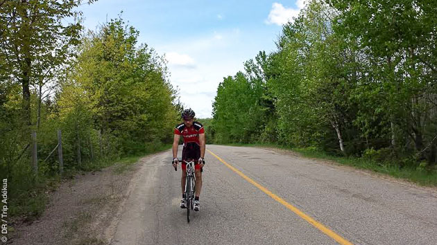 En août, assistez au départ de l'IronMan de Mont Tremblant au Québec, pendant votre séjour vélo itinérant dans les montages des Laurentides